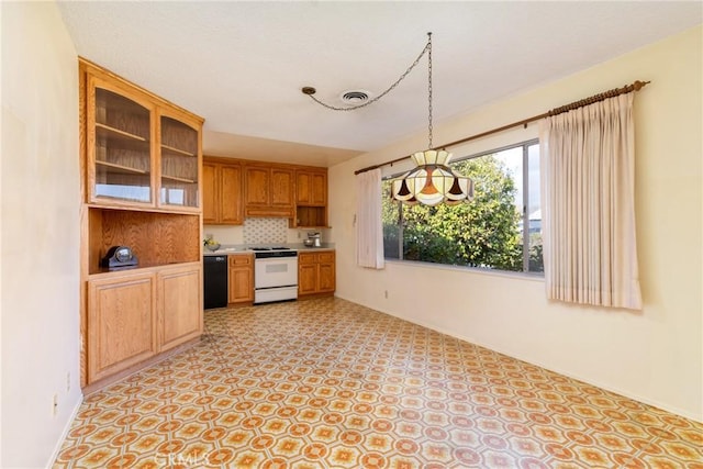 kitchen with pendant lighting, dishwasher, backsplash, and white range