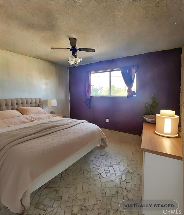 bedroom featuring ceiling fan