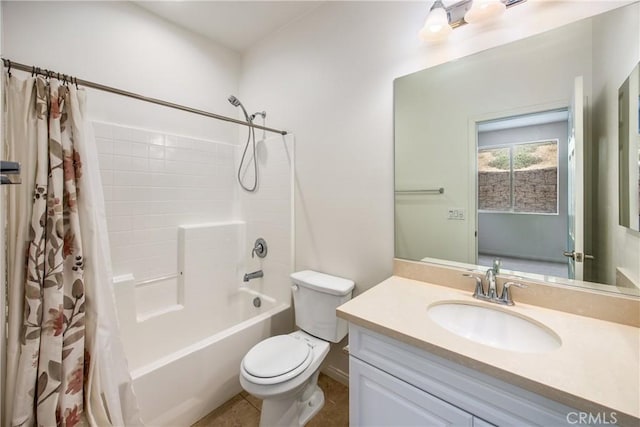 full bathroom featuring vanity, shower / tub combo with curtain, tile patterned floors, and toilet