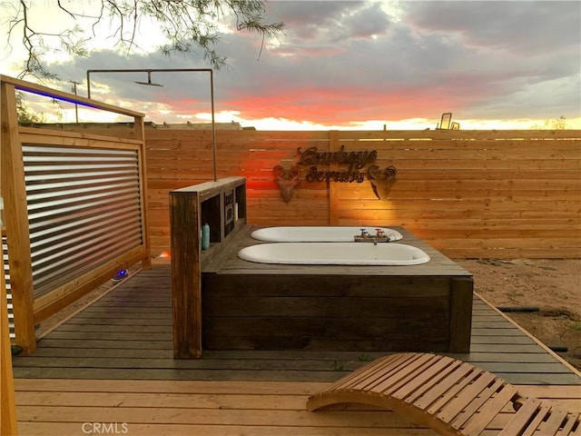 exterior space featuring a hot tub