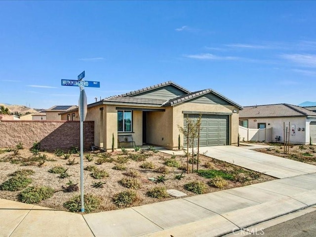 ranch-style home with a garage