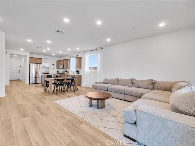 living room with light wood-type flooring