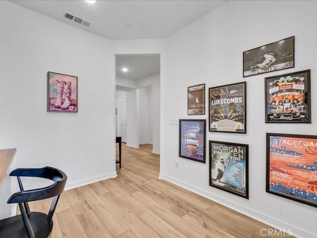 hallway featuring light wood-type flooring