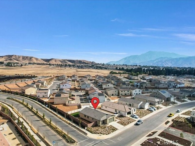 bird's eye view with a mountain view