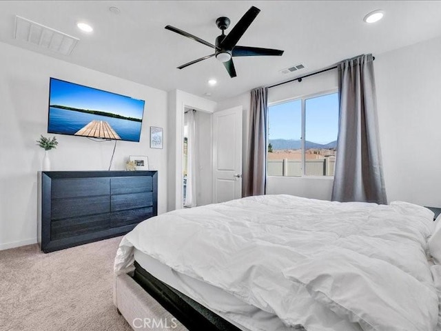 bedroom featuring ceiling fan and carpet flooring