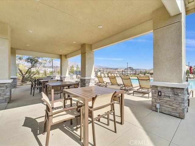 view of patio / terrace with a water view