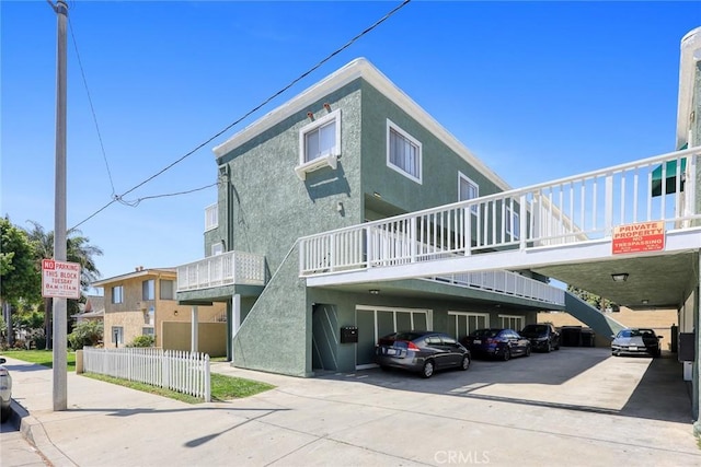 exterior space featuring stucco siding
