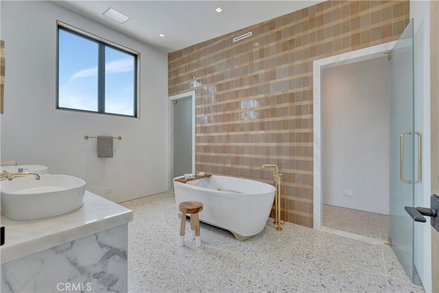 bathroom featuring a tub and sink