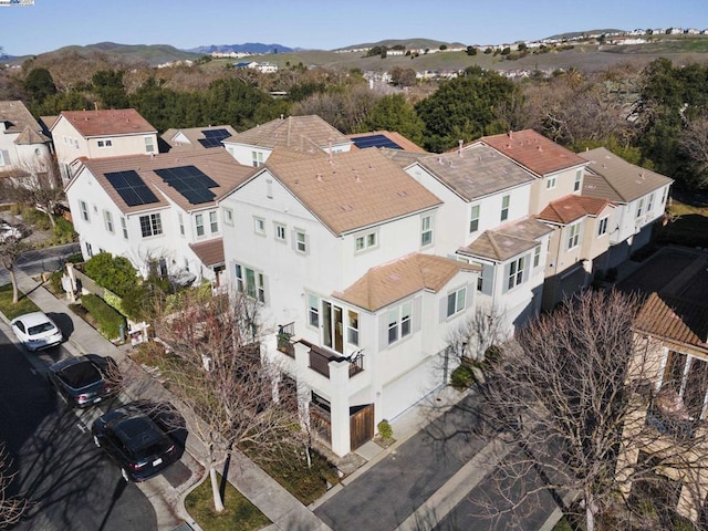 birds eye view of property with a mountain view