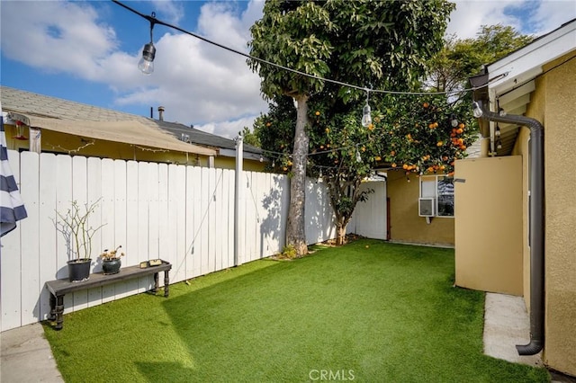 view of yard featuring a fenced backyard