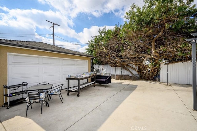 garage with fence