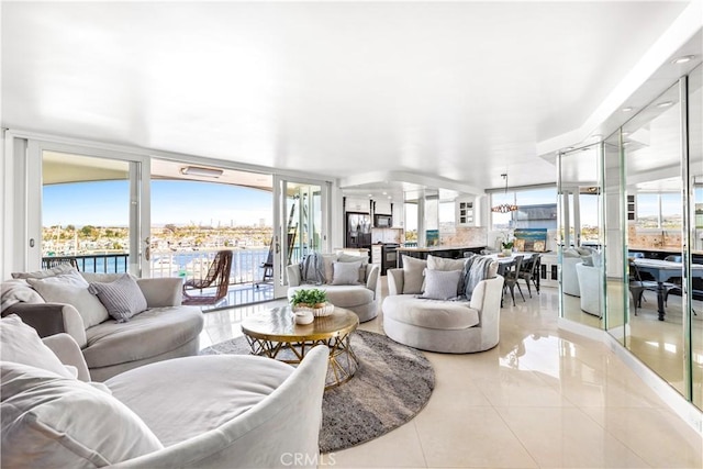 tiled living room with floor to ceiling windows