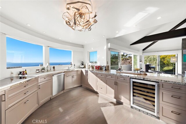 766 Pelican, Laguna Beach, CA 92651 - kitchen with wine cooler, dishwasher, electric stovetop, light wood-style floors, and a sink