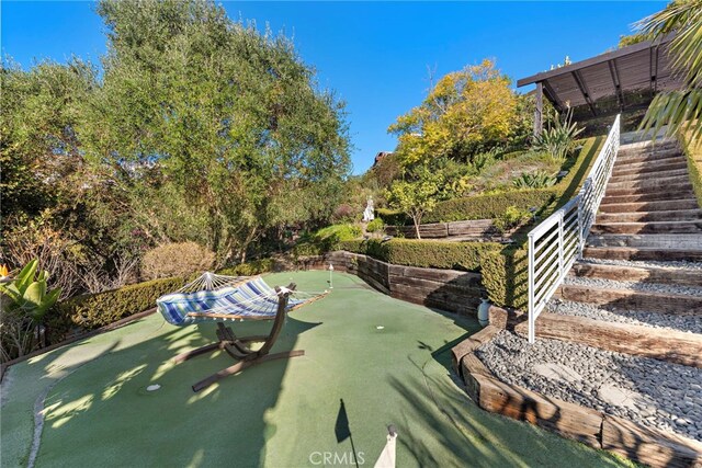 766 Pelican, Laguna Beach, CA 92651 - view of yard with an area to practice putting and stairs