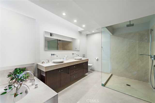766 Pelican, Laguna Beach, CA 92651 - bathroom featuring walk in shower, recessed lighting, a bath, and double vanity