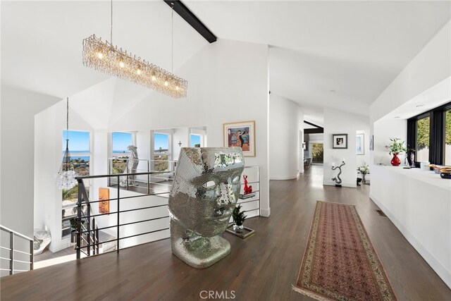 766 Pelican, Laguna Beach, CA 92651 - hallway with an upstairs landing, high vaulted ceiling, wood finished floors, beam ceiling, and baseboards