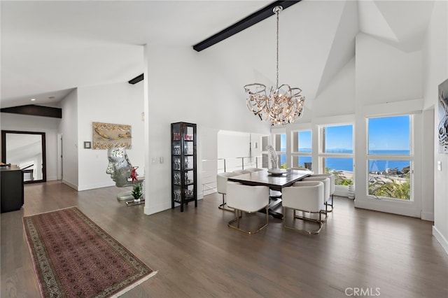 dining space featuring dark hardwood / wood-style flooring, a chandelier, a water view, high vaulted ceiling, and beam ceiling