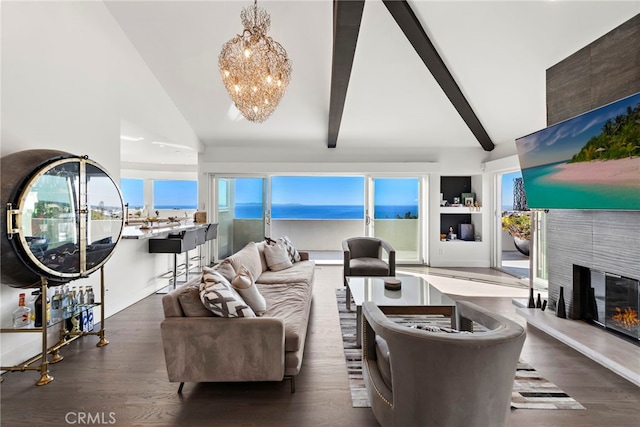 living room featuring high vaulted ceiling, dark hardwood / wood-style flooring, beam ceiling, and a tiled fireplace