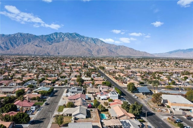 drone / aerial view featuring a mountain view