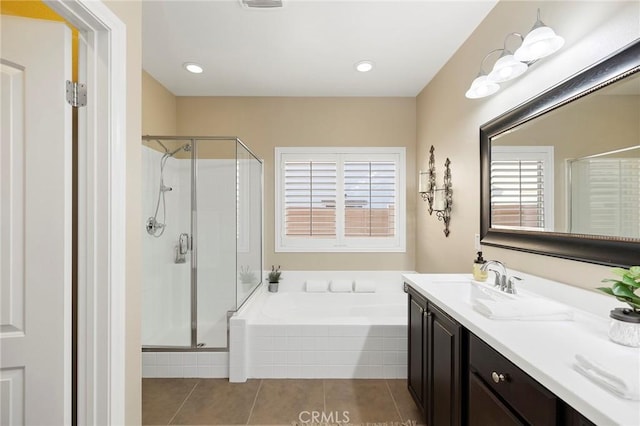 bathroom featuring vanity, tile patterned floors, and independent shower and bath