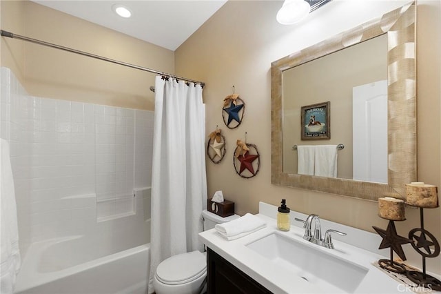 full bathroom featuring vanity, shower / tub combo, and toilet