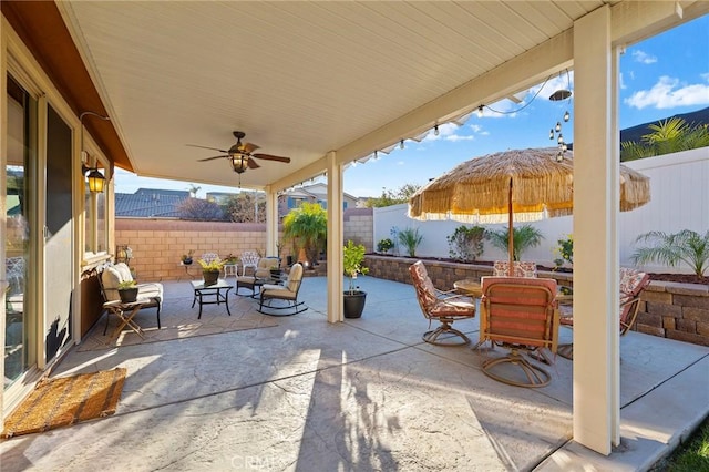 view of patio / terrace featuring ceiling fan