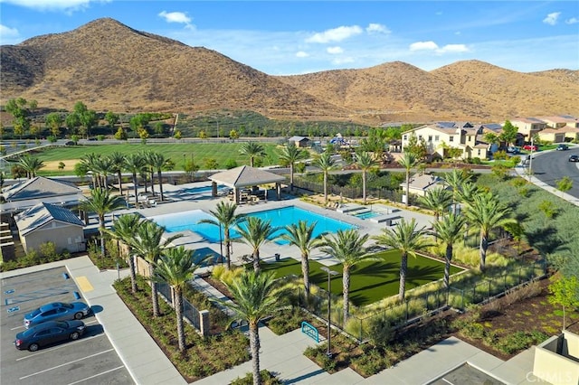 view of pool featuring a gazebo, a mountain view, and a patio