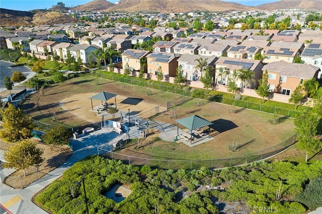 birds eye view of property featuring a mountain view