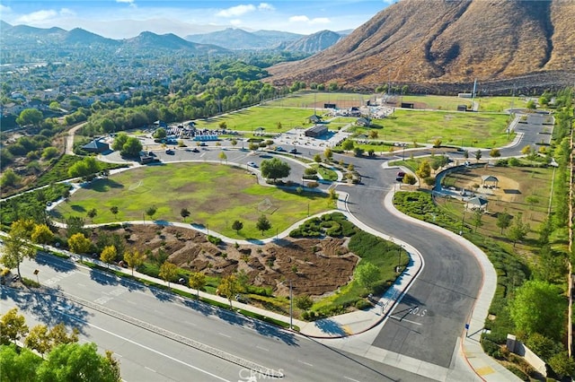 birds eye view of property featuring a mountain view