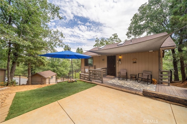 view of patio / terrace with an outdoor structure