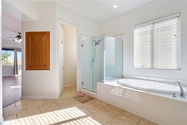 bathroom featuring ceiling fan, tile patterned flooring, and separate shower and tub