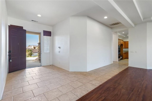 entrance foyer featuring light tile patterned flooring