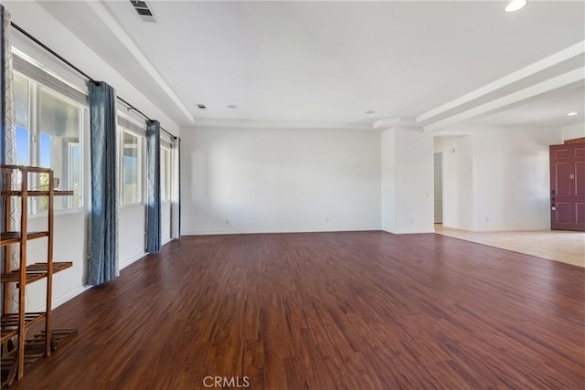 empty room featuring hardwood / wood-style flooring