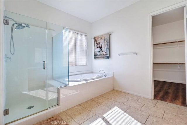 bathroom with plus walk in shower and tile patterned floors