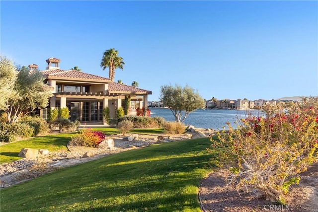 view of yard with a water view