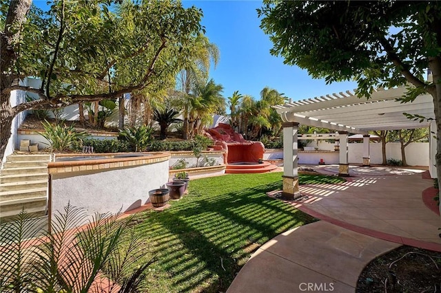 view of yard with a patio area and a pergola