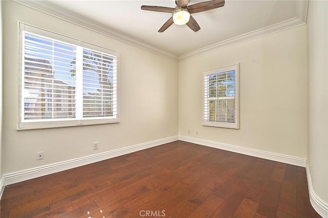 empty room featuring ceiling fan, wood-type flooring, and crown molding