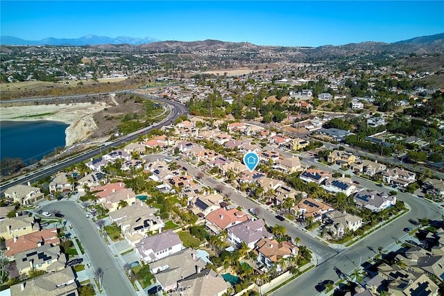 aerial view with a water and mountain view