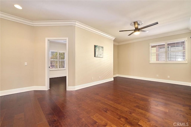 spare room featuring ceiling fan, plenty of natural light, and crown molding