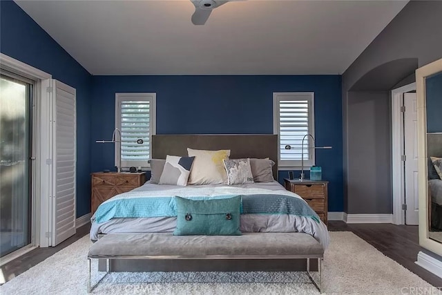 bedroom featuring ceiling fan and wood-type flooring