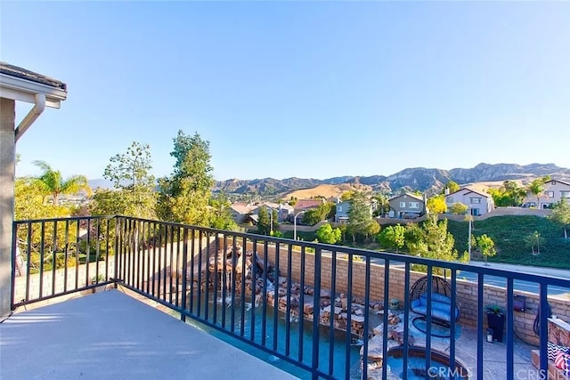 balcony featuring a mountain view