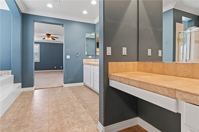 bathroom featuring ornamental molding, vanity, independent shower and bath, ceiling fan, and tile patterned flooring