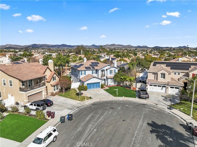 drone / aerial view featuring a mountain view