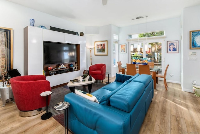 living room with light hardwood / wood-style floors