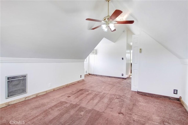 bonus room featuring lofted ceiling, carpet floors, a wall unit AC, and ceiling fan