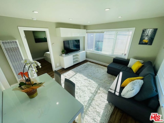 living room featuring dark hardwood / wood-style floors