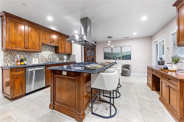 kitchen featuring sink, stainless steel dishwasher, island exhaust hood, and a kitchen island