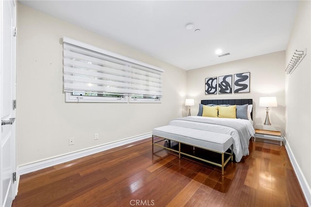 bedroom featuring hardwood / wood-style floors