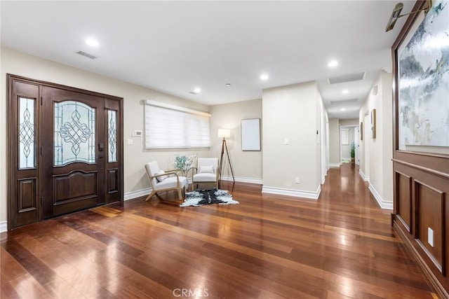 foyer featuring dark hardwood / wood-style floors