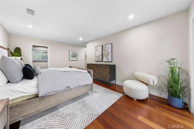 bedroom featuring hardwood / wood-style floors